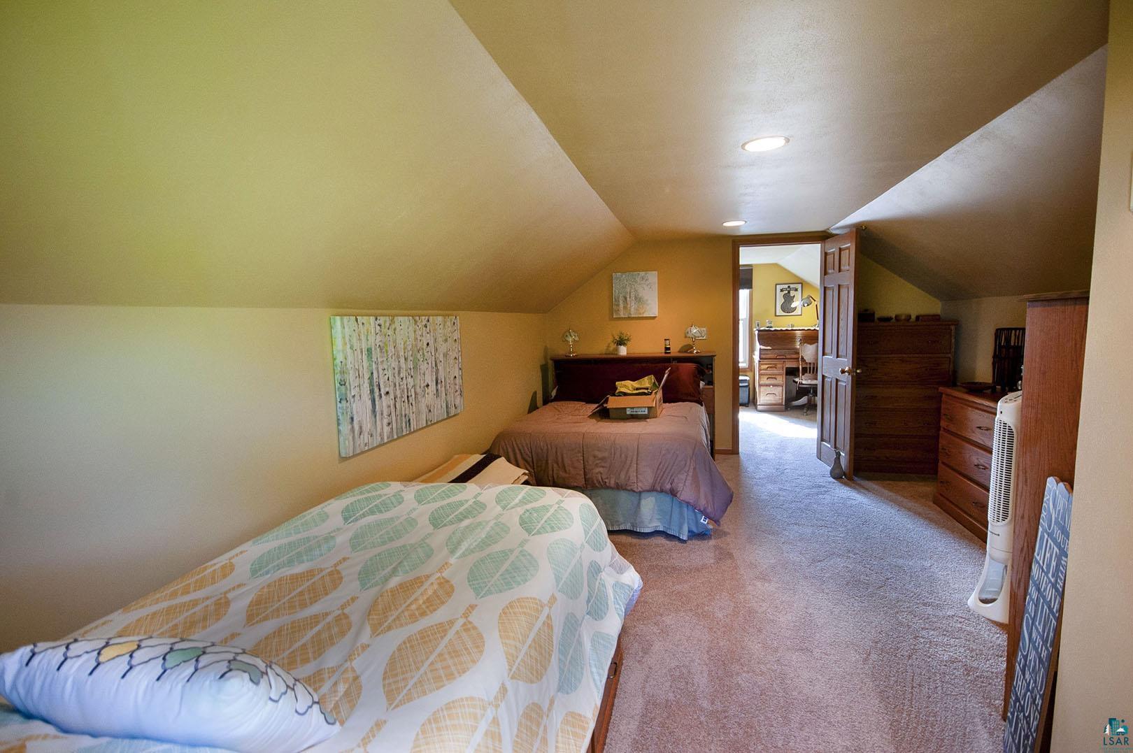 4726 Hermantown Road Hermantown, MN 55811 - Photo 24 of 40 Carpeted bedroom featuring lofted ceiling