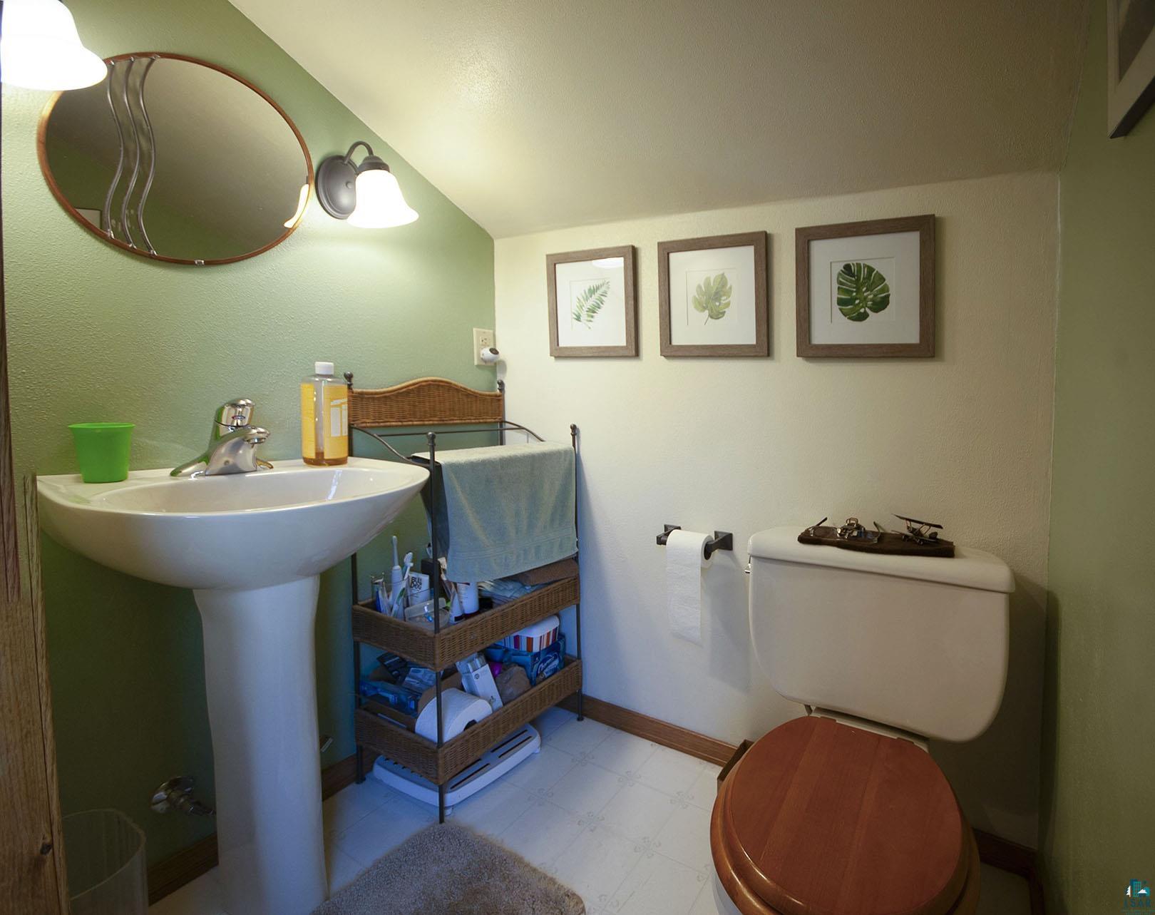 4726 Hermantown Road Hermantown, MN 55811 - Photo 29 of 40 Bathroom featuring tile patterned floors and toilet