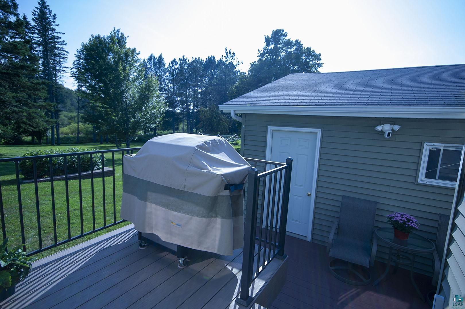 4726 Hermantown Road Hermantown, MN 55811 - Photo 37 of 40 Deck featuring a yard and a grill