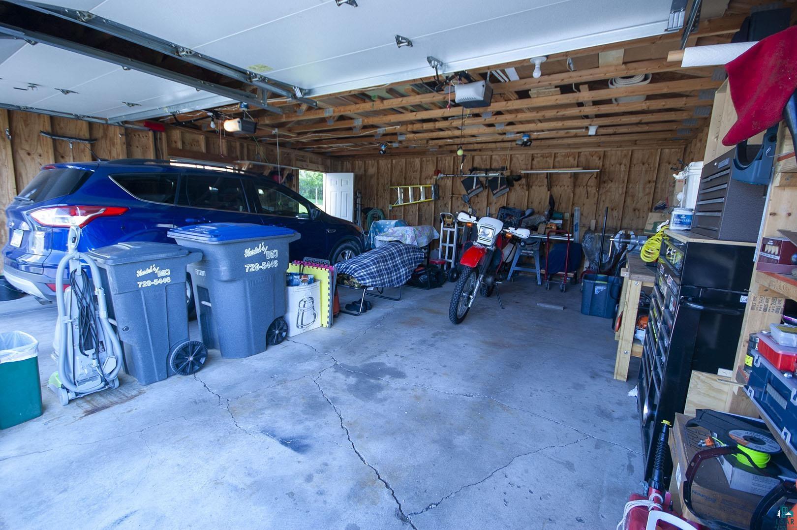 4726 Hermantown Road Hermantown, MN 55811 - Photo 39 of 40 Garage with a garage door opener