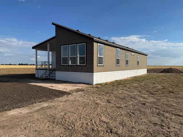 a picture of a bench in front of a door