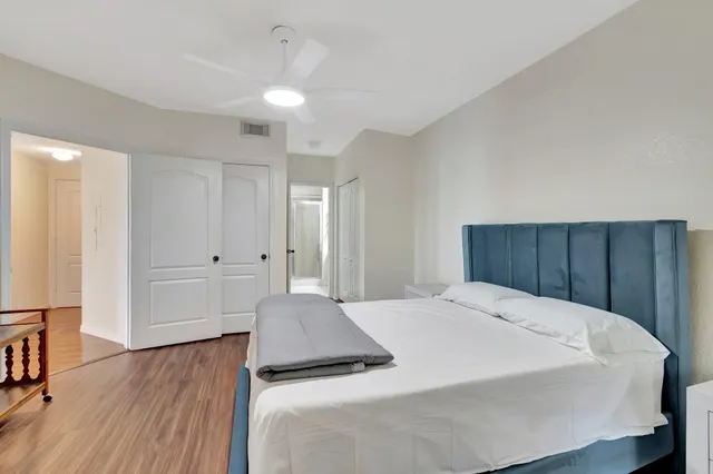 a bathroom with a toilet and a bathtub