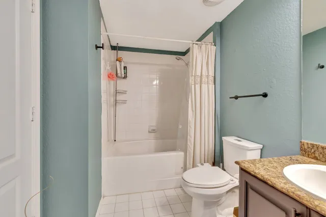 a view of a backyard with sitting area