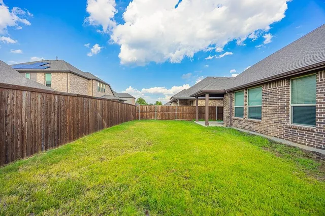 a view of a backyard with a garden
