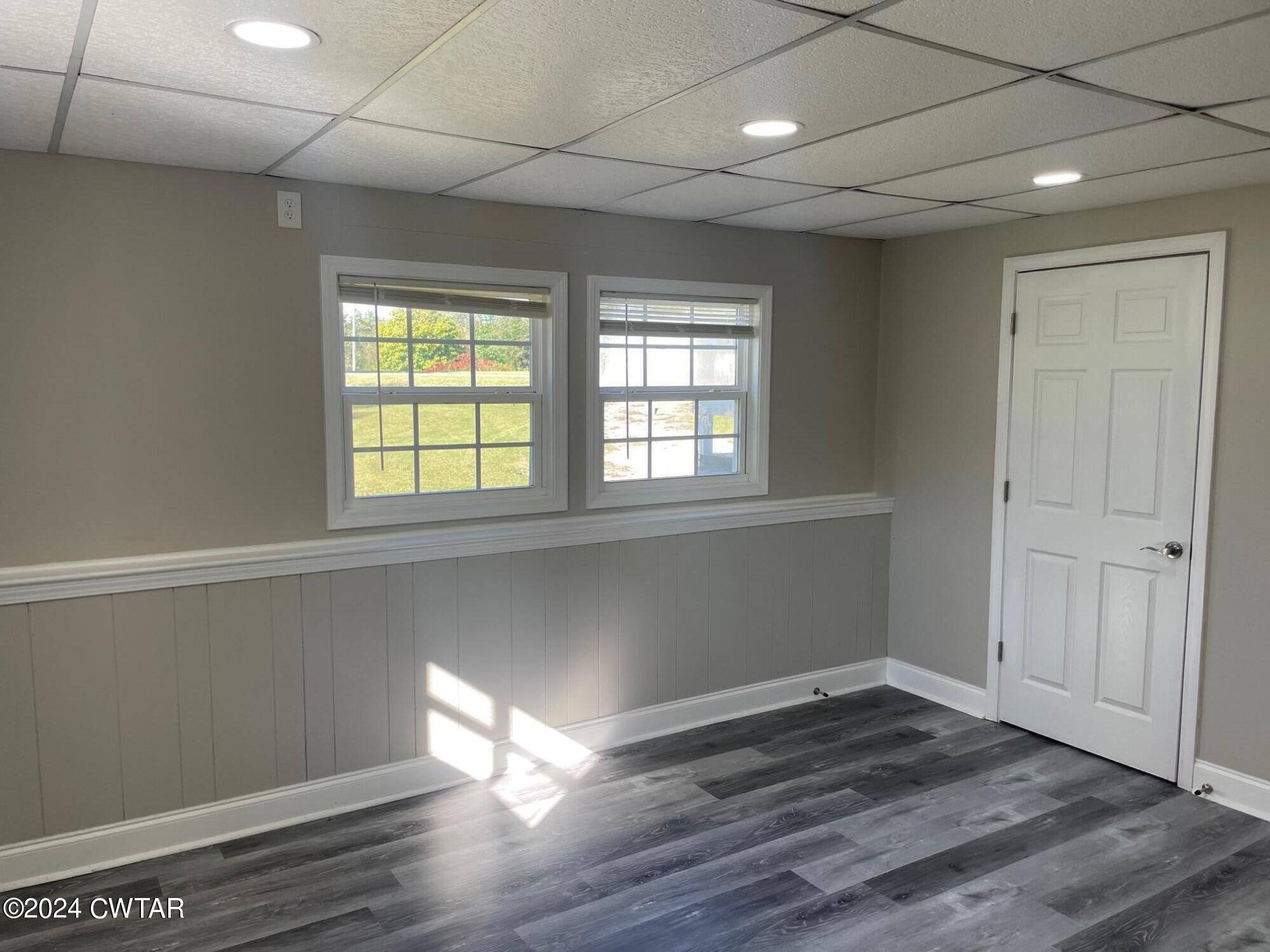 113 Ebenezer Road Mercer, TN 38392 - Photo 11 of 36 a view of empty room with wooden floor and fan