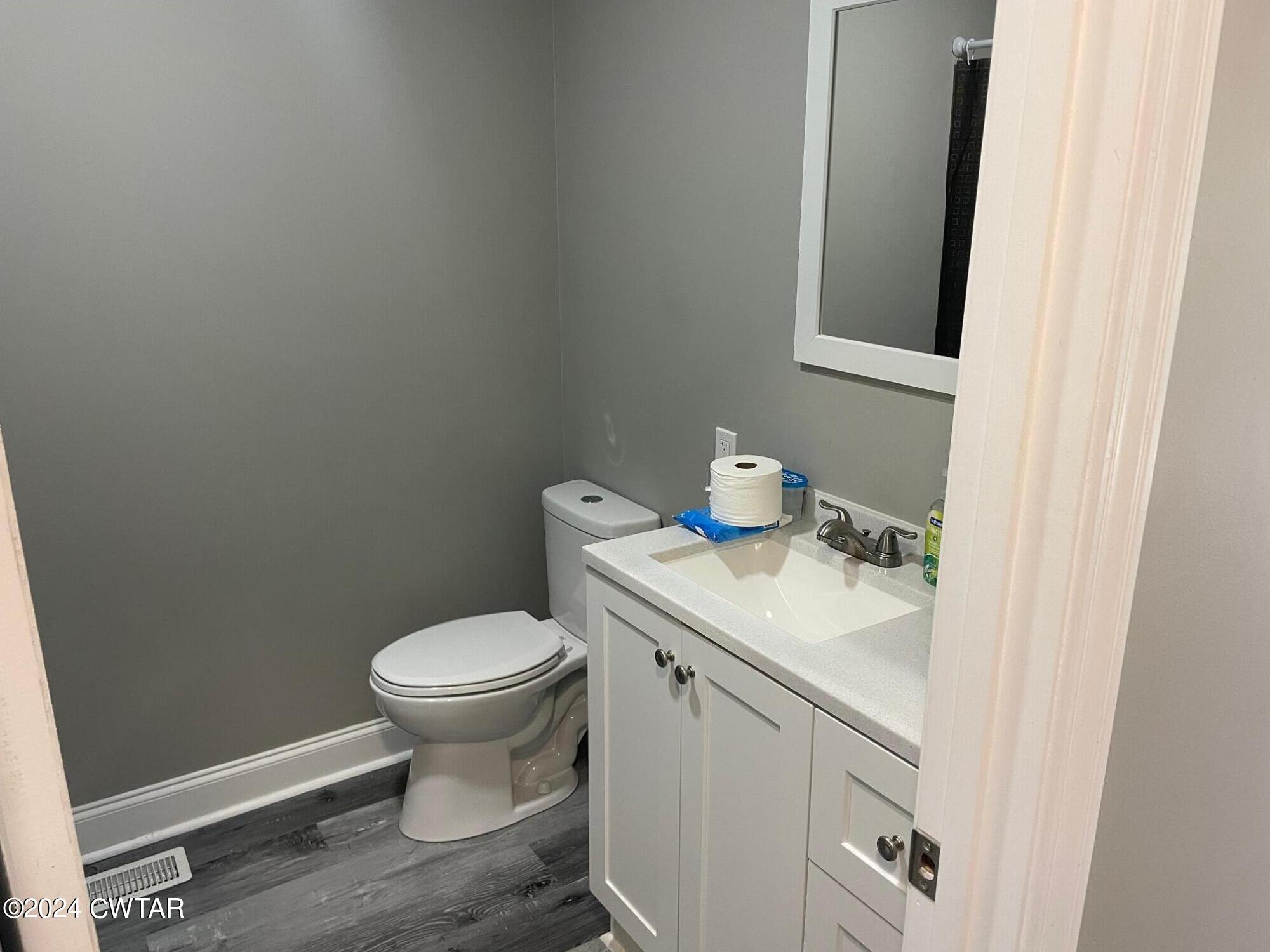 113 Ebenezer Road Mercer, TN 38392 - Photo 14 of 36 a white toilet sitting next to a bathroom sink