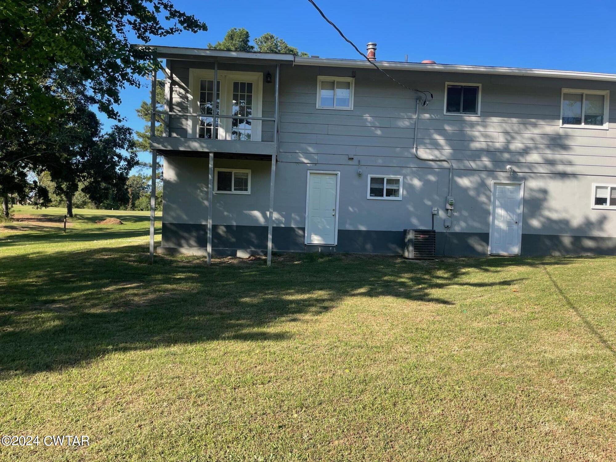 113 Ebenezer Road Mercer, TN 38392 - Photo 19 of 36 a front view of a house with a yard