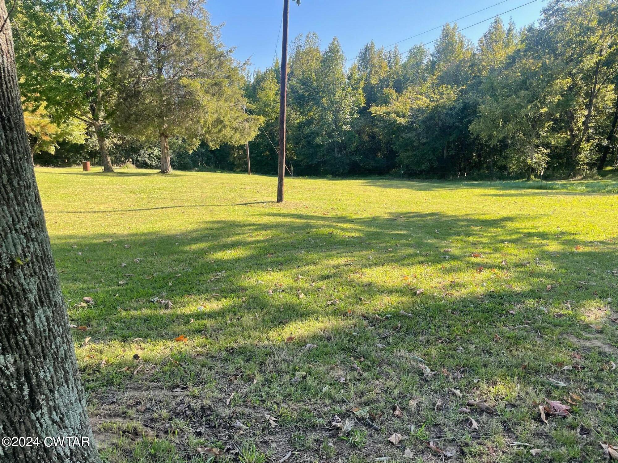 113 Ebenezer Road Mercer, TN 38392 - Photo 26 of 36 a view of a swimming pool with an outdoor space
