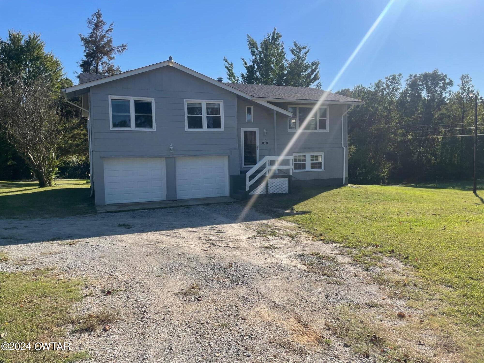 113 Ebenezer Road Mercer, TN 38392 - Photo 3 of 36 a view of a house with a yard