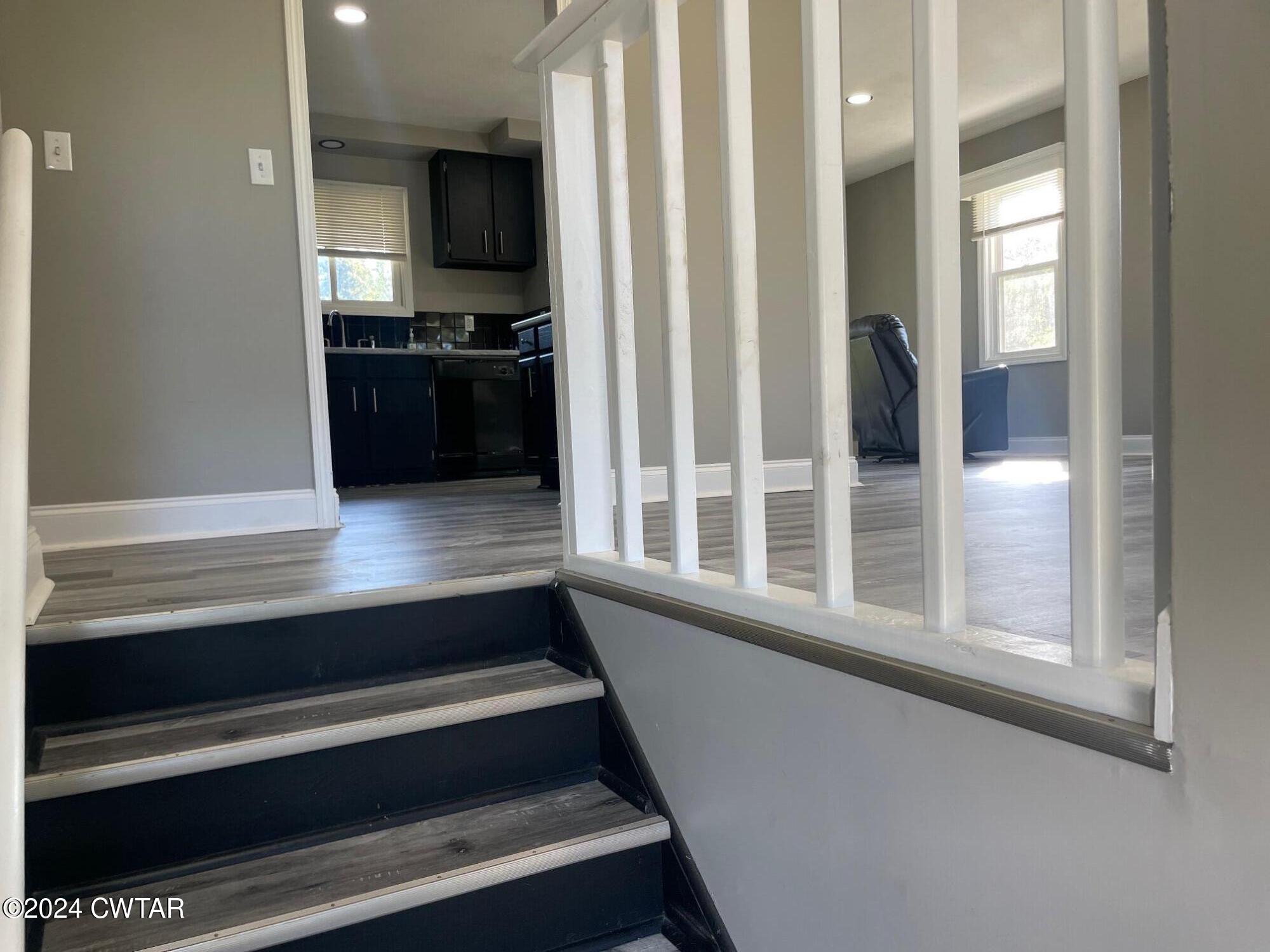113 Ebenezer Road Mercer, TN 38392 - Photo 32 of 36 a kitchen with stainless steel appliances a refrigerator and a stove