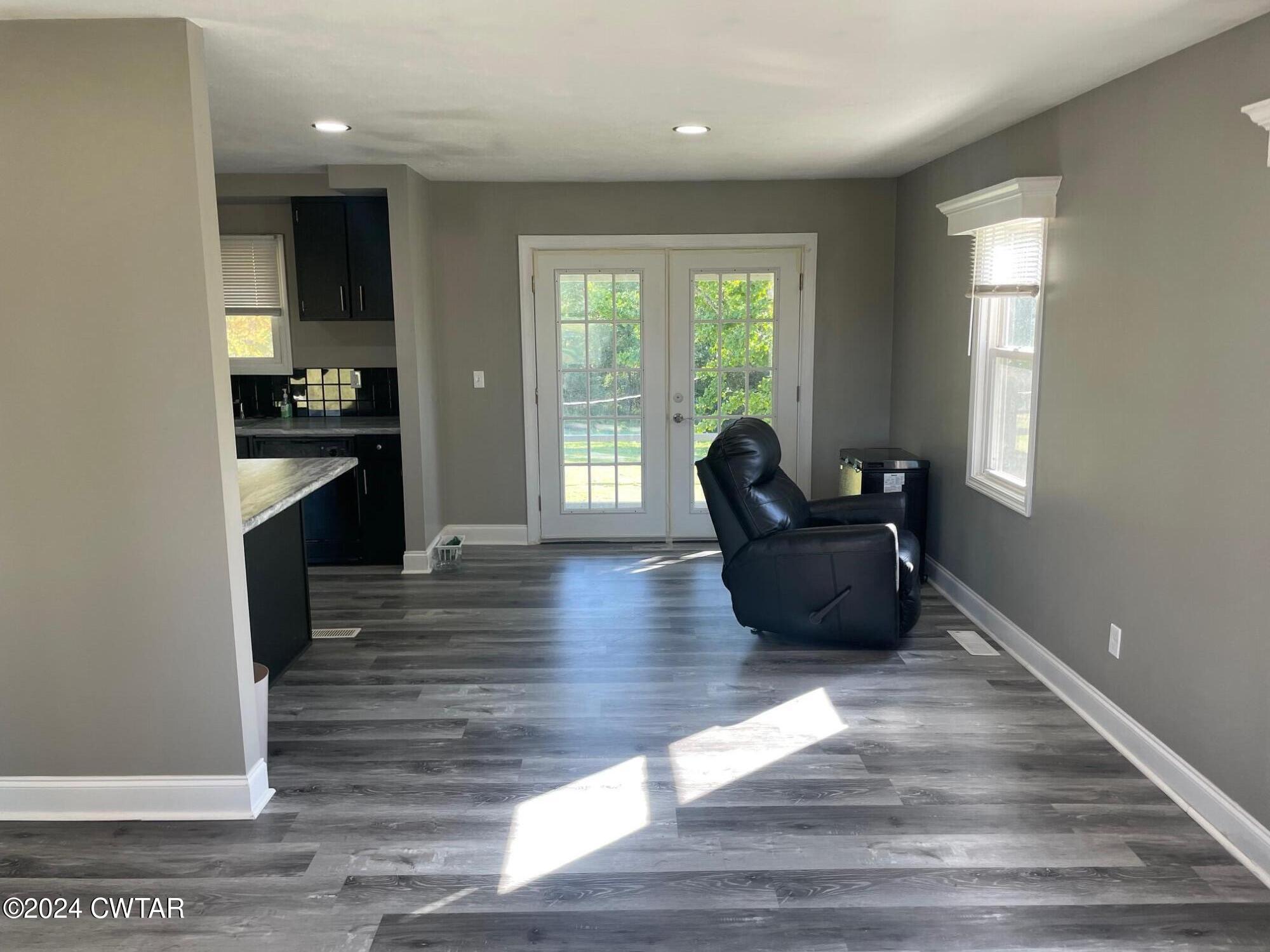 113 Ebenezer Road Mercer, TN 38392 - Photo 36 of 36 a living room with furniture and a wooden floor