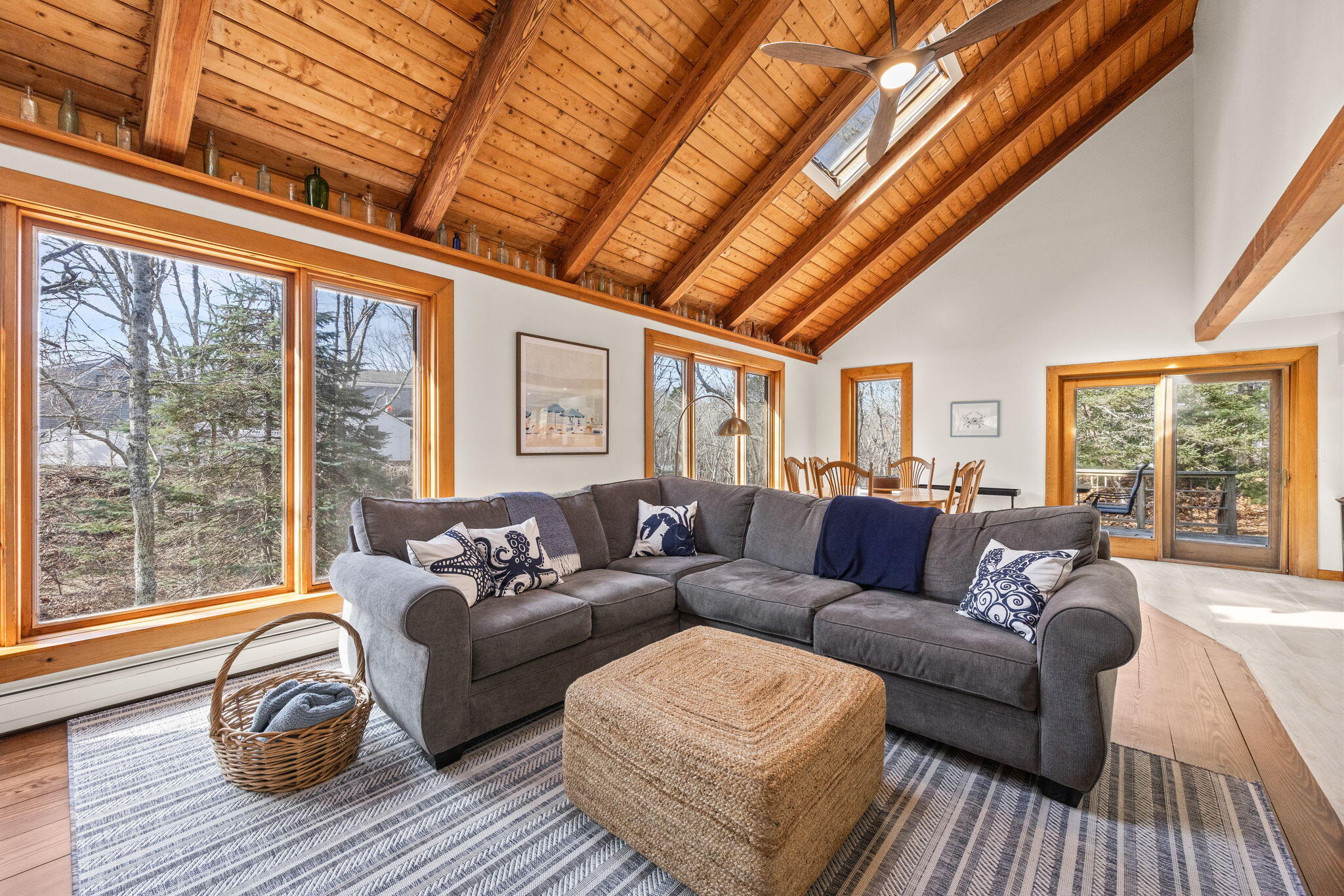 6 Deer Path Truro, MA 02666 - Photo 13 of 41 a living room with furniture and a large window