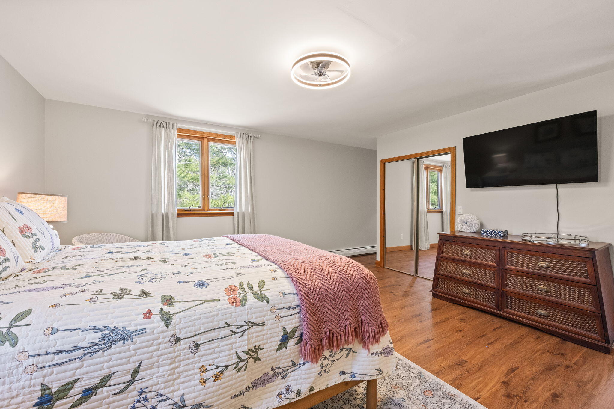 6 Deer Path Truro, MA 02666 - Photo 20 of 41 a bedroom with a bed and a flat screen tv