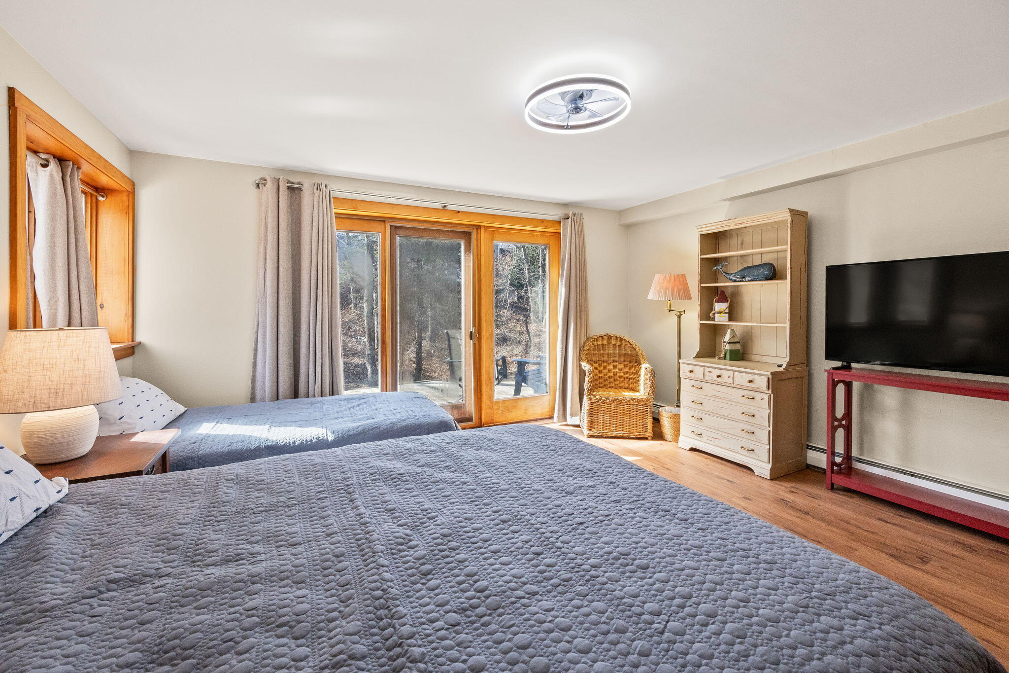 6 Deer Path Truro, MA 02666 - Photo 28 of 41 a large bedroom with a large bed and flat tv