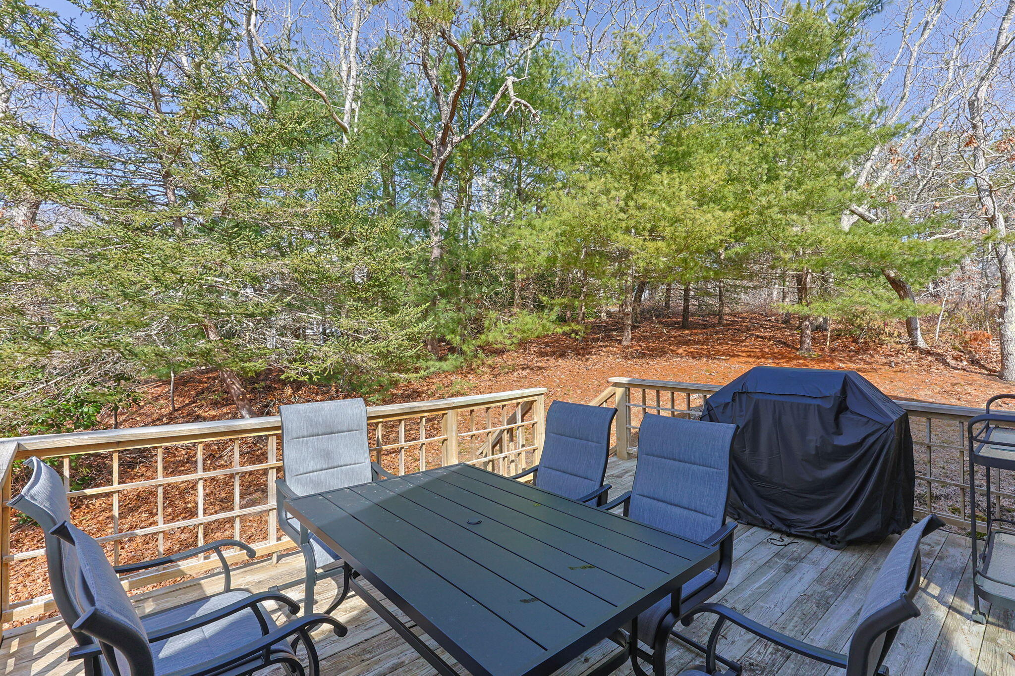 6 Deer Path Truro, MA 02666 - Photo 31 of 41 a view of a chairs and table on the deck