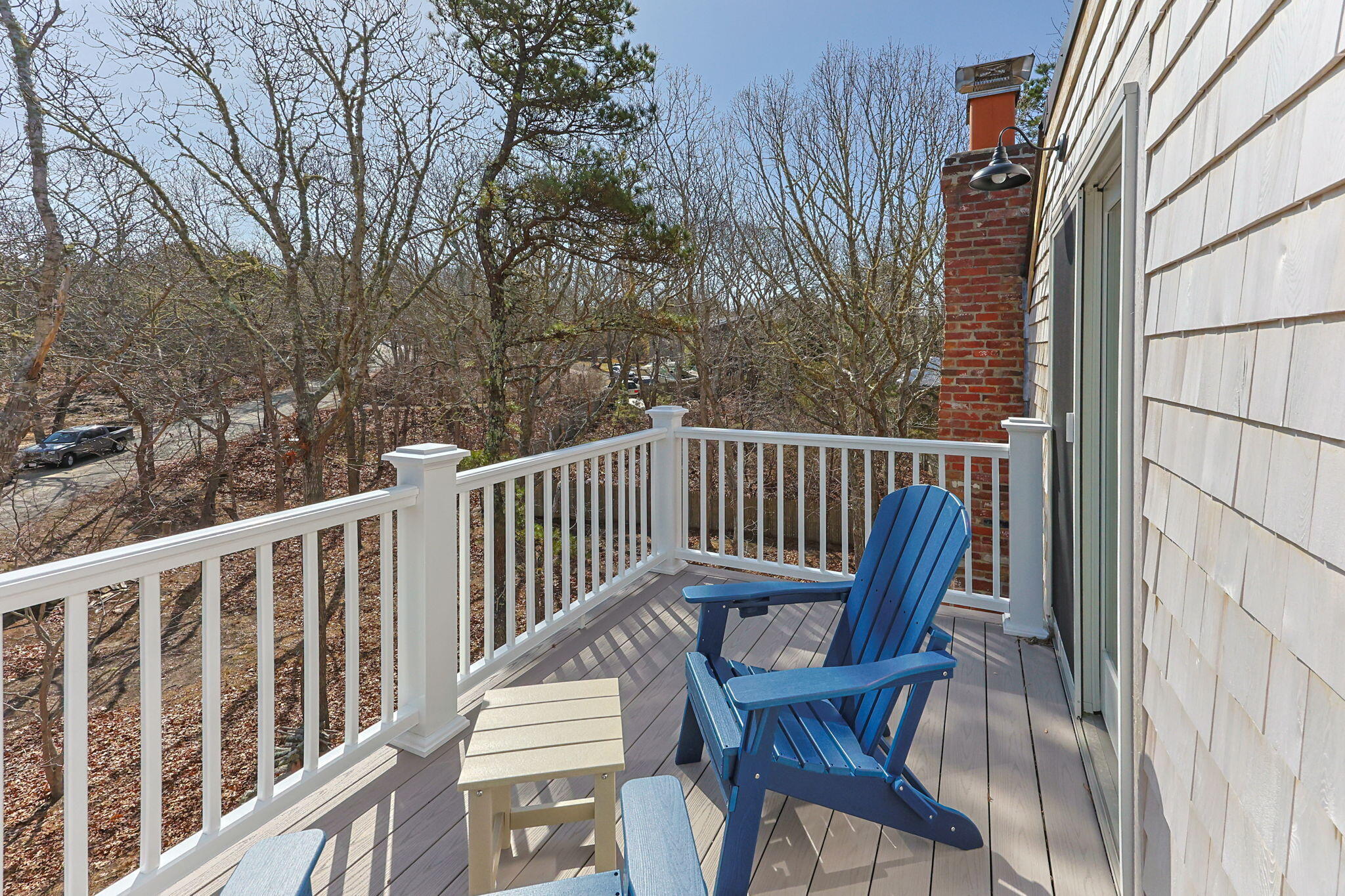 6 Deer Path Truro, MA 02666 - Photo 35 of 41 a view of a chair and table in the balcony