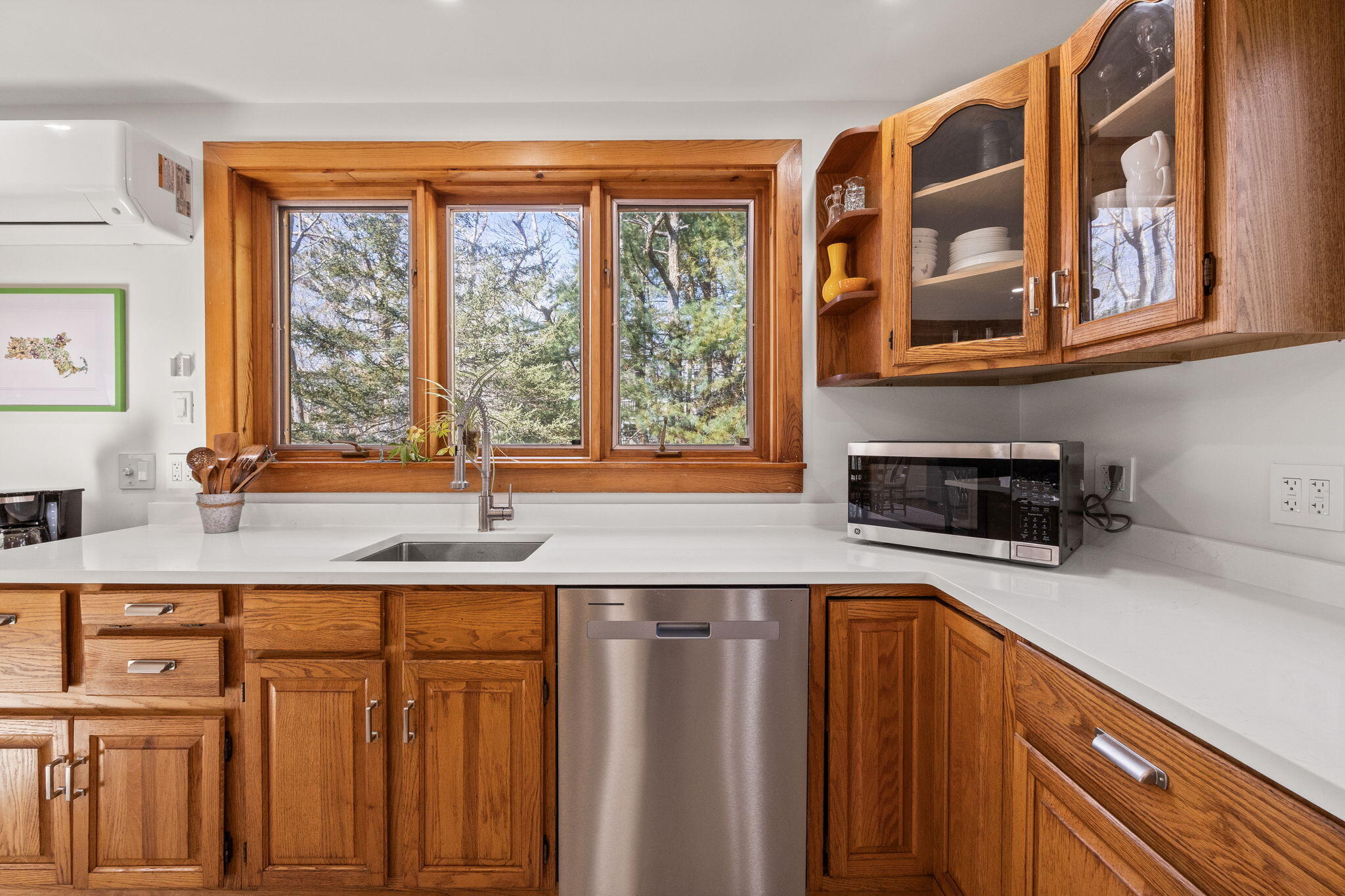 6 Deer Path Truro, MA 02666 - Photo 8 of 41 a kitchen with stainless steel appliances granite countertop a sink and a granite counter tops with a large window