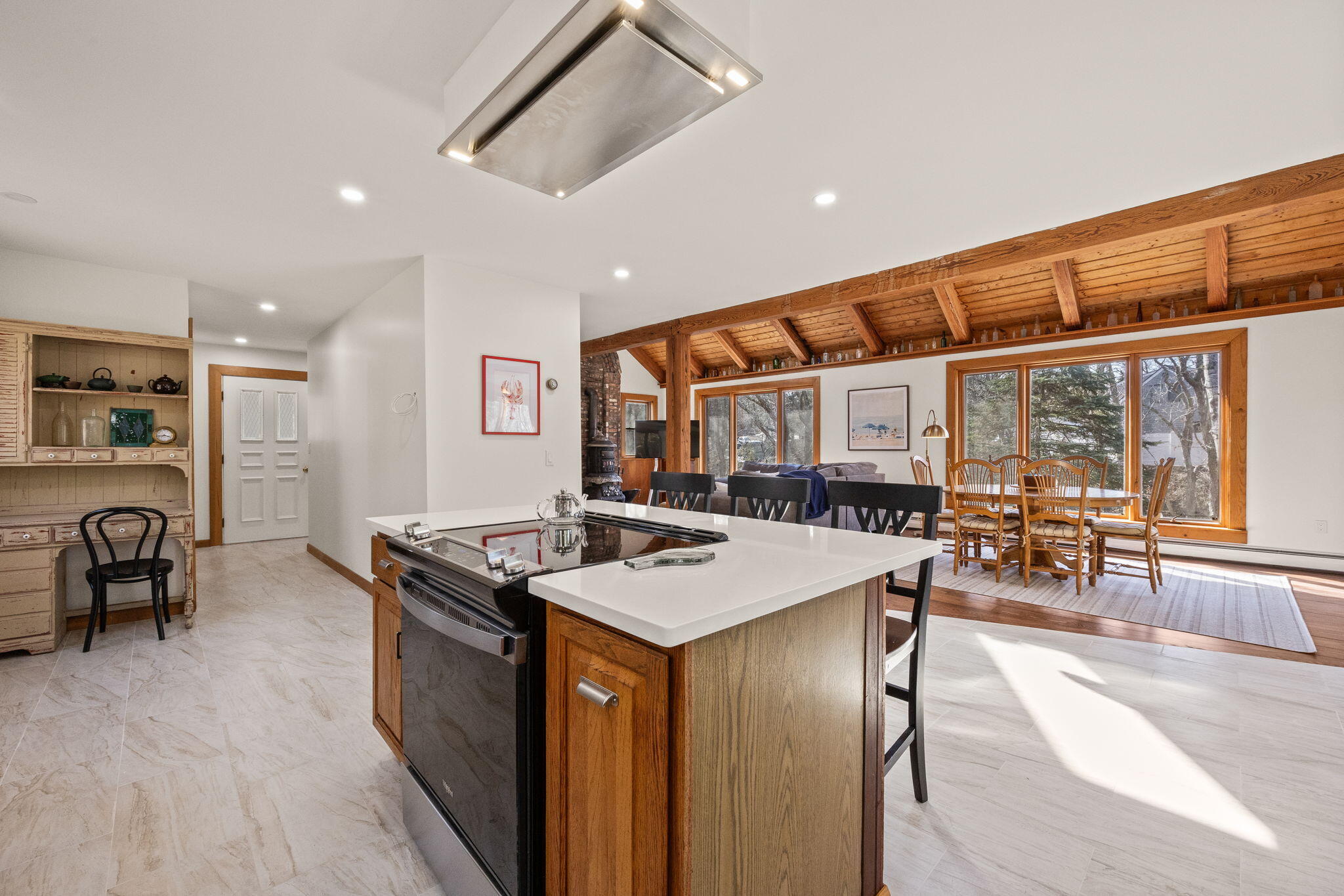 6 Deer Path Truro, MA 02666 - Photo 9 of 41 a kitchen with stainless steel appliances granite countertop sink stove and wooden cabinets