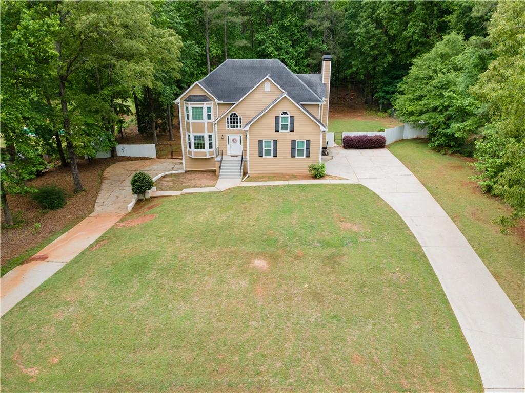 405 Ridgemont Drive Fayetteville, GA 30215 - Photo 40 of 43 a view of a house with pool and garden