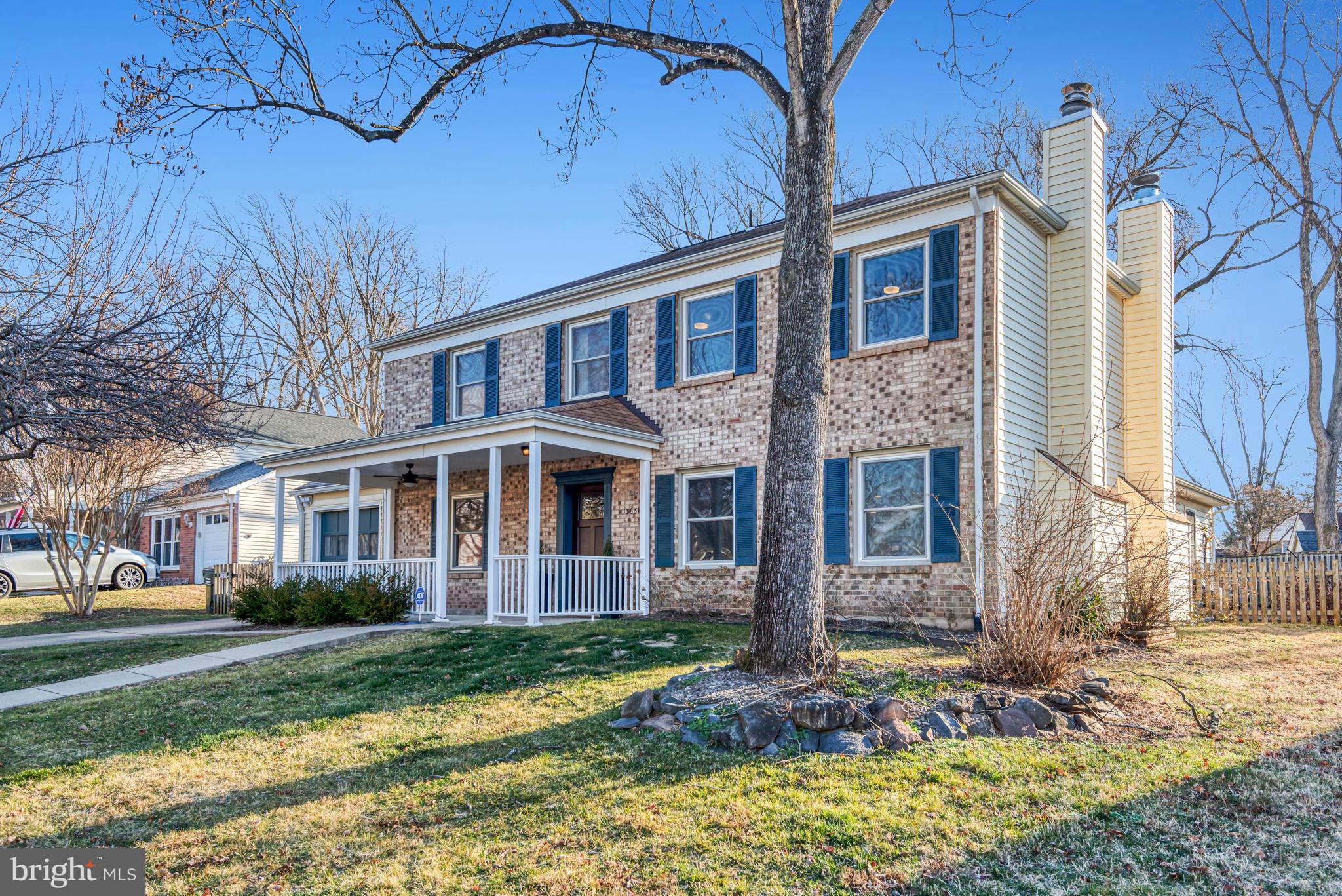 13631 Ellendale Drive Chantilly, VA 20151 - Photo 7 of 54 a front view of a house with garden