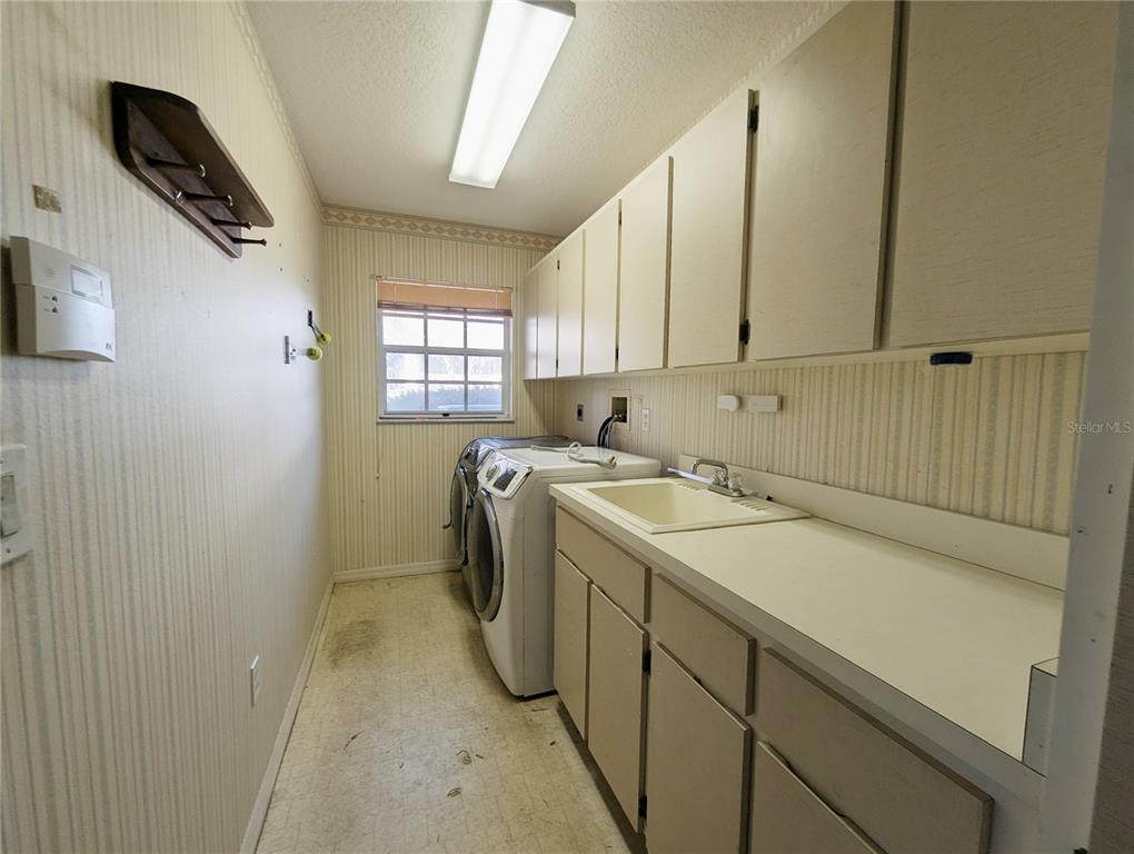 3 Graytwig Court West Homosassa, FL 34446 - Photo 27 of 41 a utility room with dryer and washer