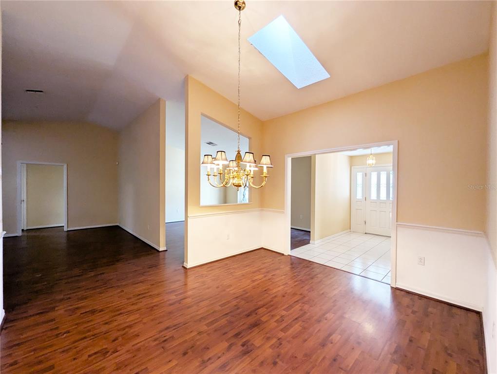 3 Graytwig Court West Homosassa, FL 34446 - Photo 3 of 41 a view of empty room with wooden floor