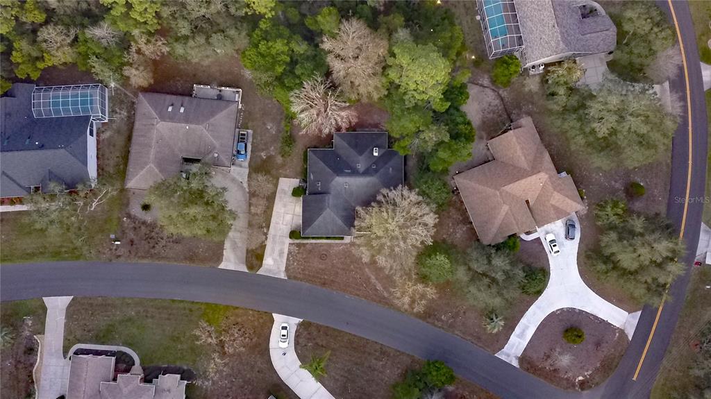 3 Graytwig Court West Homosassa, FL 34446 - Photo 39 of 41 an aerial view of a house with a yard and garden