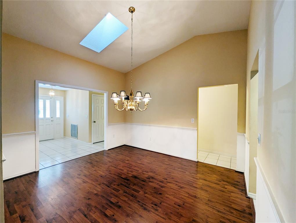 3 Graytwig Court West Homosassa, FL 34446 - Photo 7 of 41 a view of an empty room with wooden floor