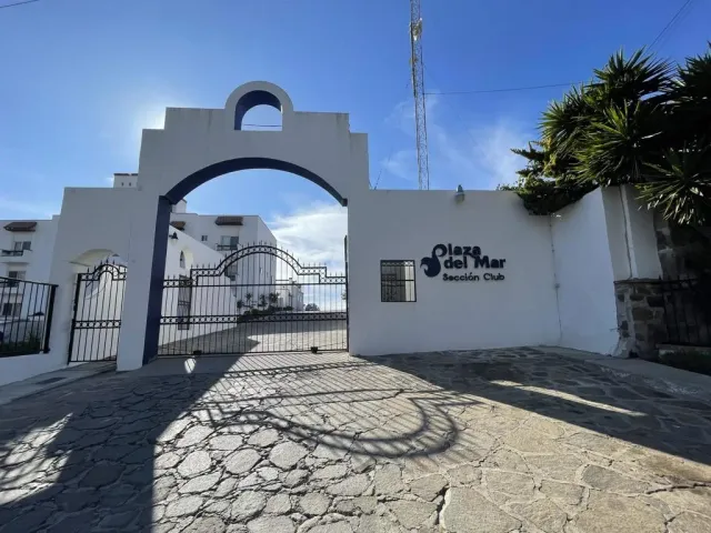 a terrace with a table and chairs
