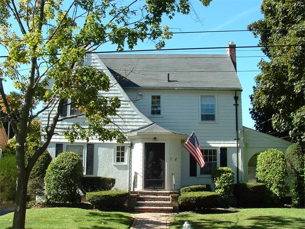 5 Thompson Road Marblehead, MA 01945 - Photo 1 of 8 a view of a house with a yard and plants