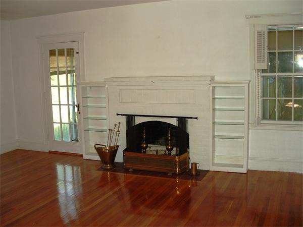 5 Thompson Road Marblehead, MA 01945 - Photo 5 of 8 a living room with furniture and a fireplace