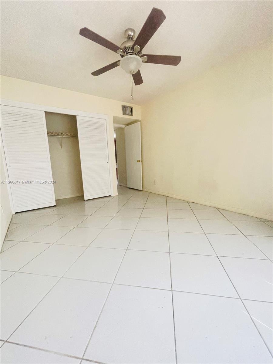 Inverrary Lauderhill, FL 33319 - Photo 10 of 18 a view of an empty room with a fan
