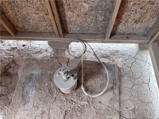 a view of a wooden floor in a kitchen