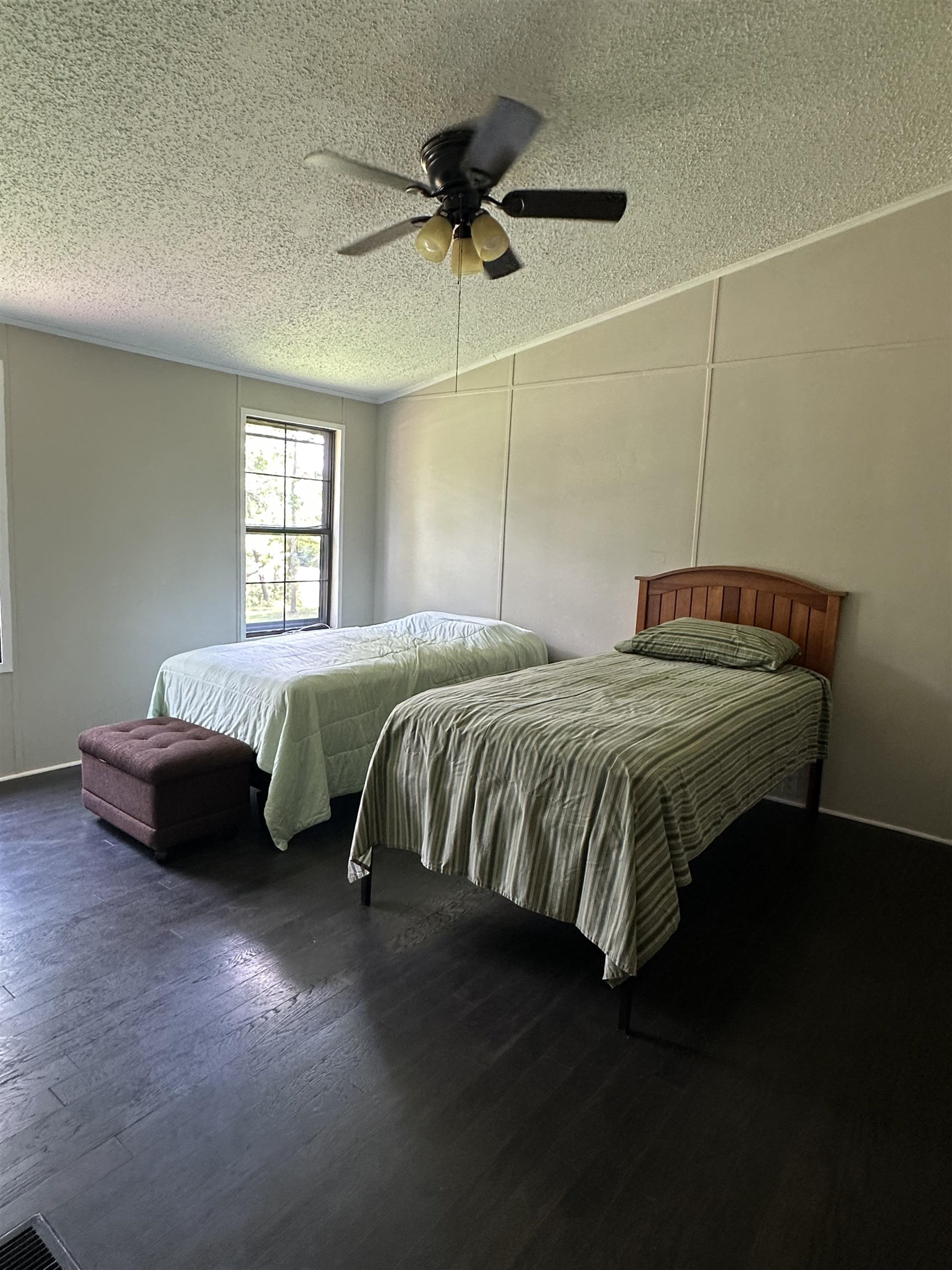 6264 45th Highway South Ramer, TN 38367 - Photo 29 of 30 a bedroom with a bed and a window