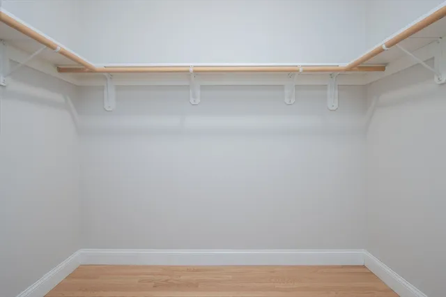 a view of an empty walk in closet