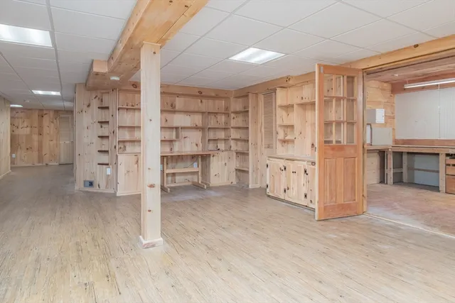 an empty room with shelves