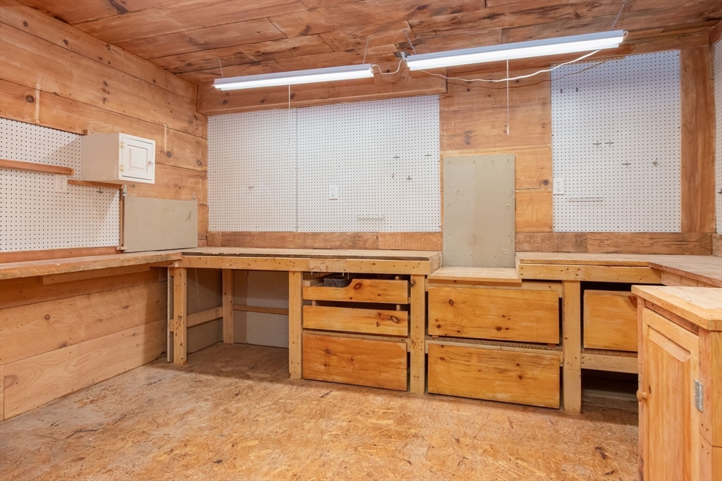 21 A Blacksmith Row, Unit 21 Groton, MA 01450 - Photo 33 of 42 a view of storage and utility room