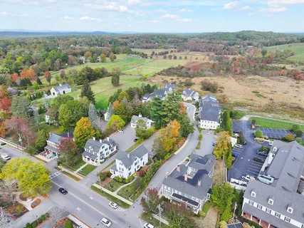a view of a swimming pool with a yard