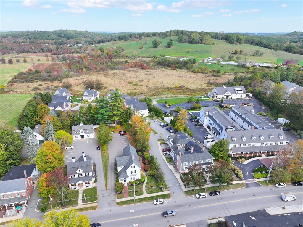 21 A Blacksmith Row, Unit 21 Groton, MA 01450 - Photo 4 of 42 an aerial view of multiple house
