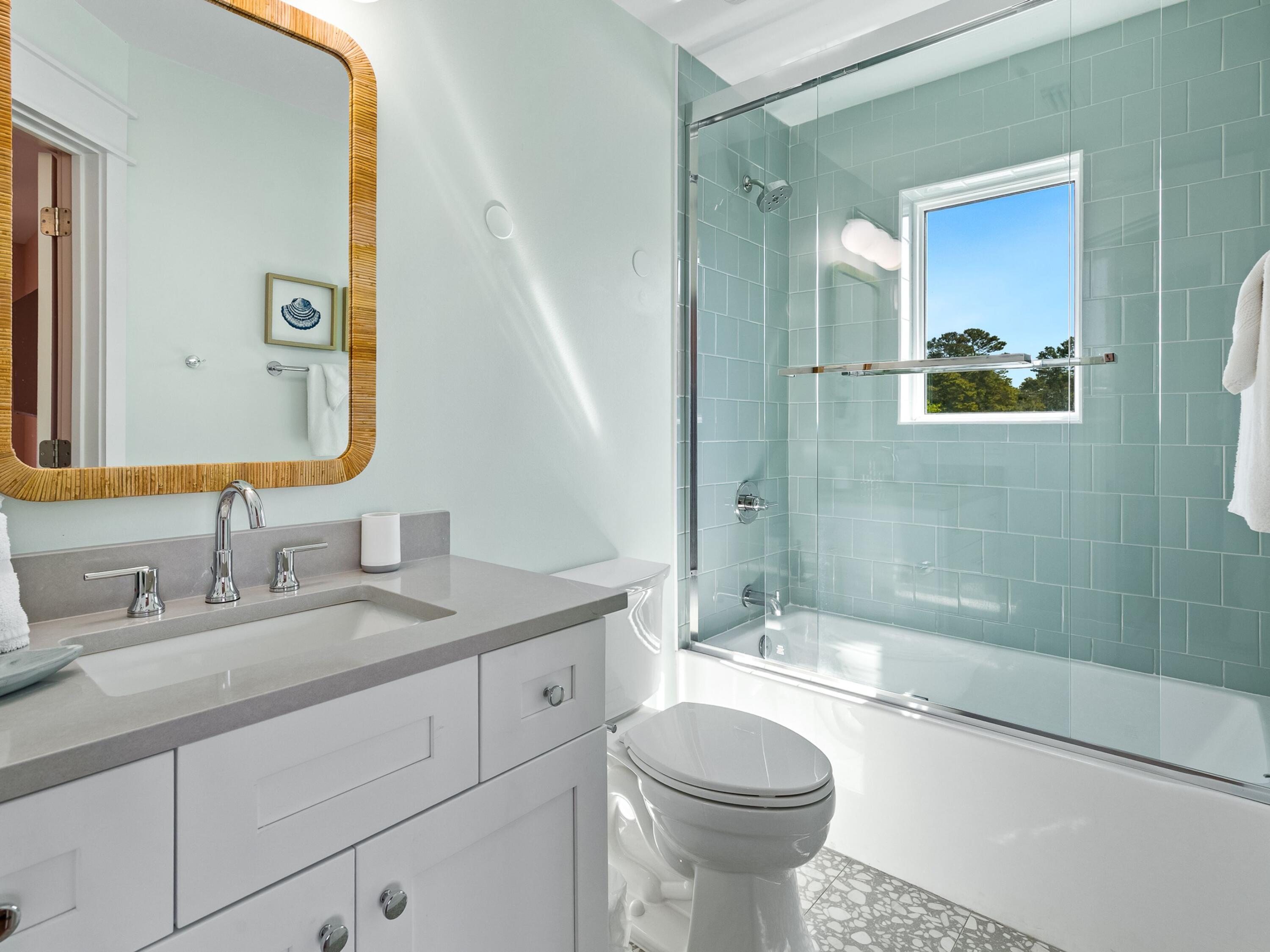 183 Walnut Street Santa Rosa Beach, FL 32459 - Photo 35 of 71 a bathroom with a granite countertop sink toilet and shower
