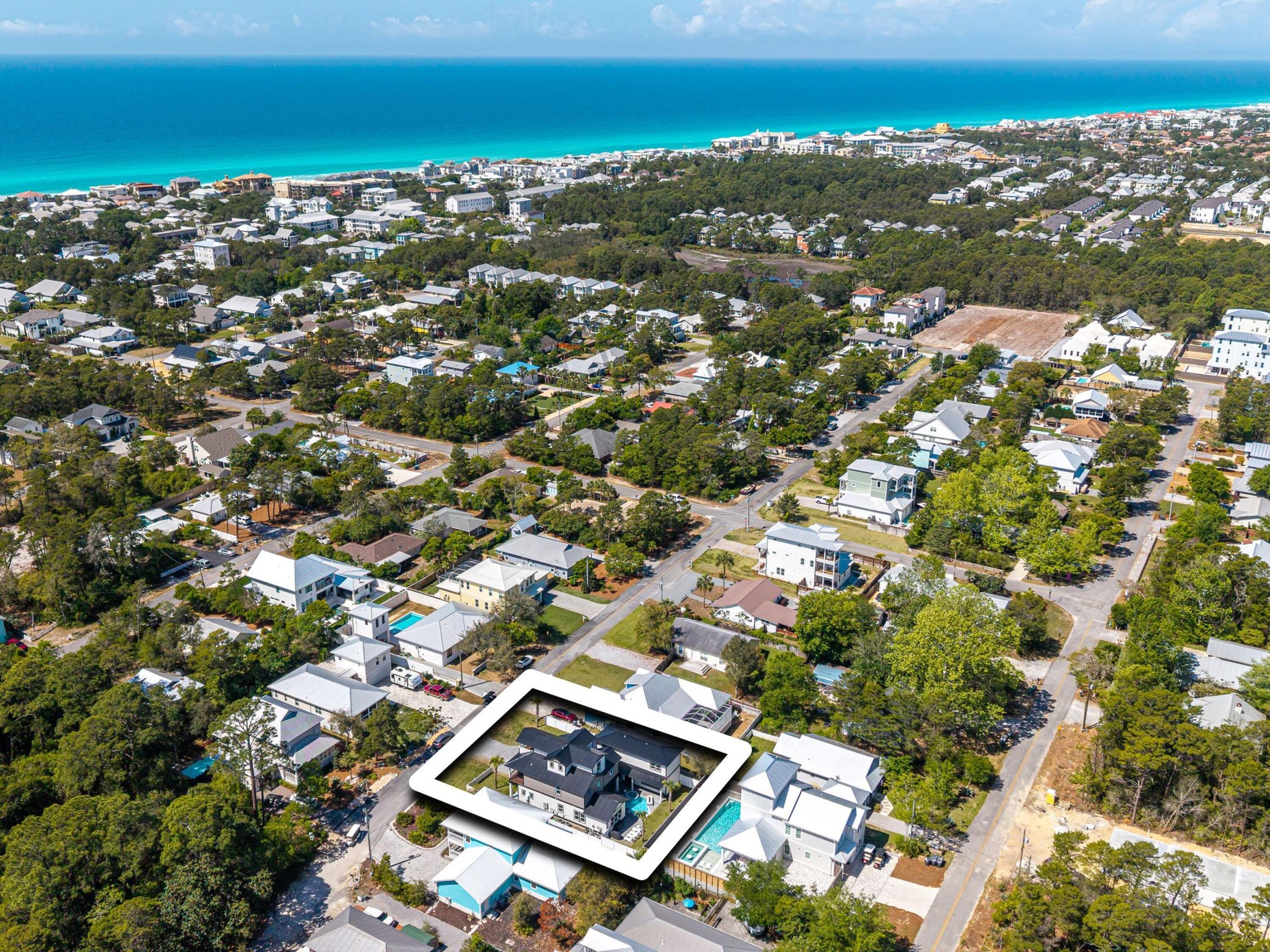 183 Walnut Street Santa Rosa Beach, FL 32459 - Photo 63 of 71 an aerial view of residential building with parking space