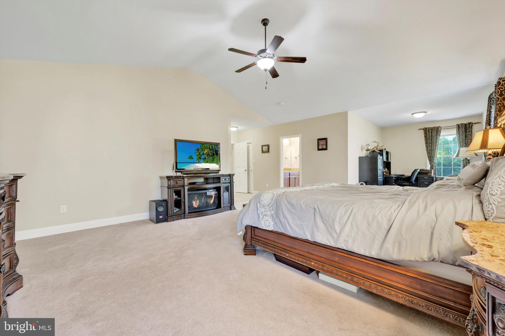 118 Connecticut Avenue Sinking Spring, PA 19608 - Photo 22 of 61 a spacious bedroom with a bed and a ceiling fan