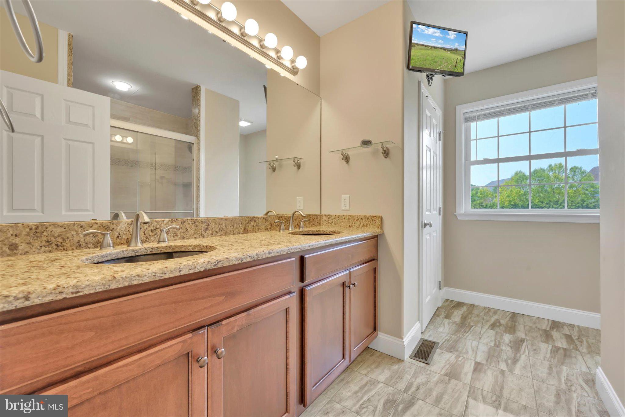 118 Connecticut Avenue Sinking Spring, PA 19608 - Photo 24 of 61 a bathroom with a sink and a mirror