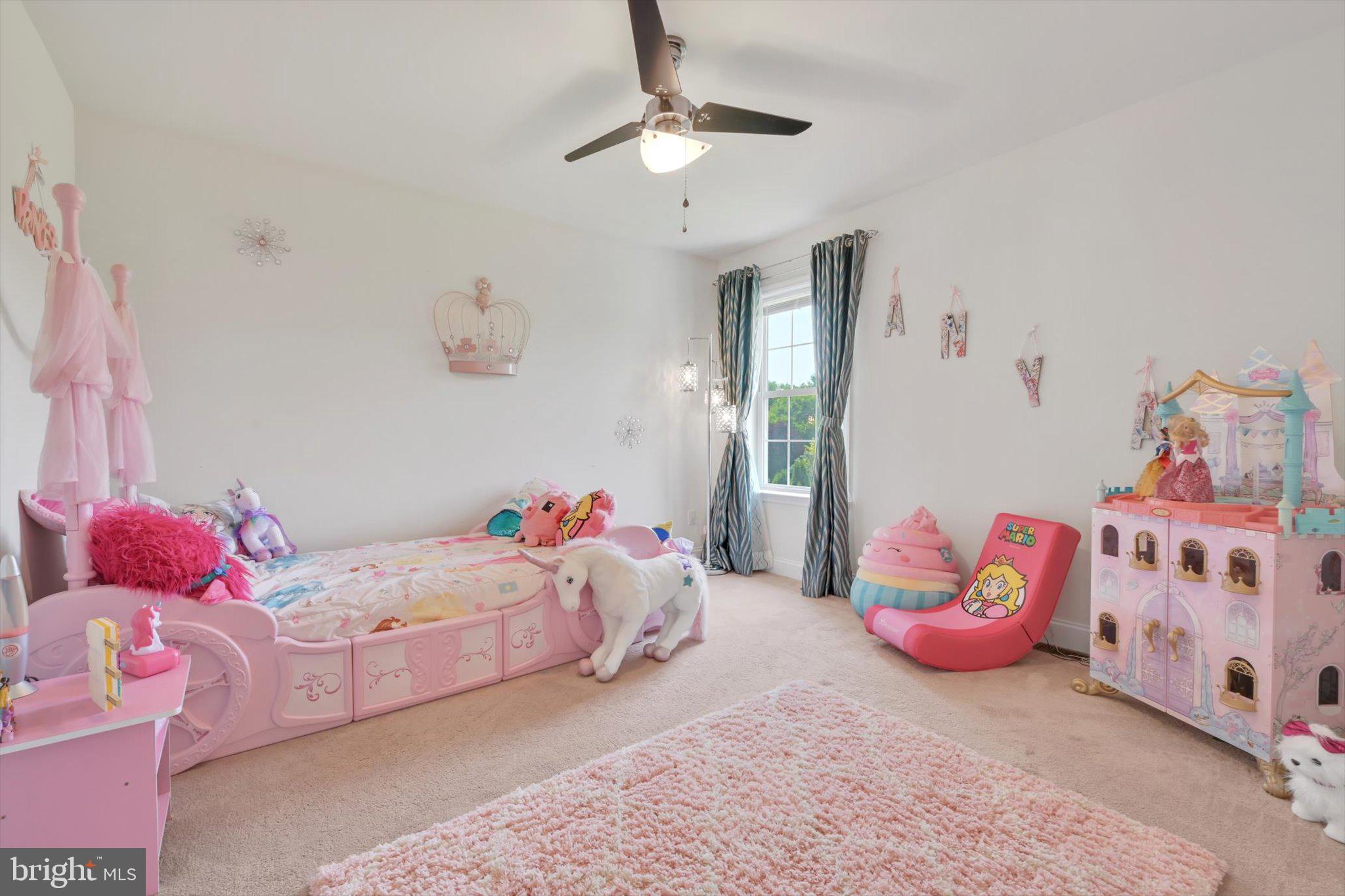 118 Connecticut Avenue Sinking Spring, PA 19608 - Photo 28 of 61 a bedroom with a bed and a chandelier