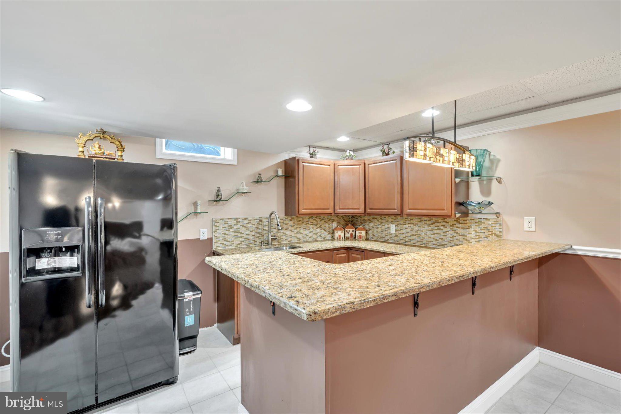 118 Connecticut Avenue Sinking Spring, PA 19608 - Photo 38 of 61 a kitchen with a counter top space a sink stainless steel appliances and cabinets
