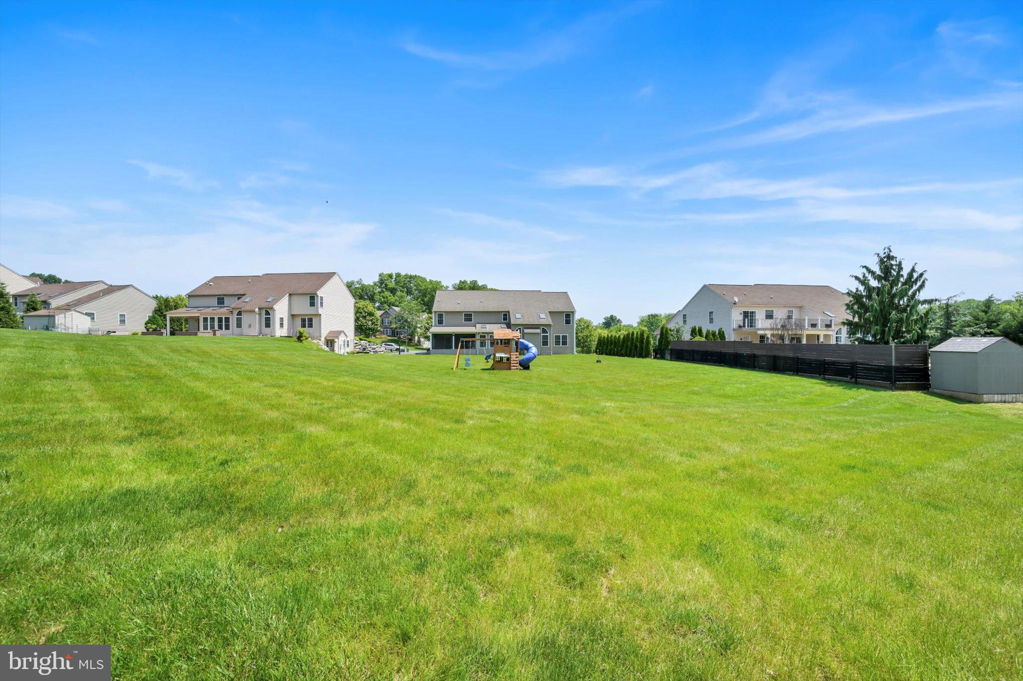 118 Connecticut Avenue Sinking Spring, PA 19608 - Photo 48 of 61 a view of a green field with house in the background