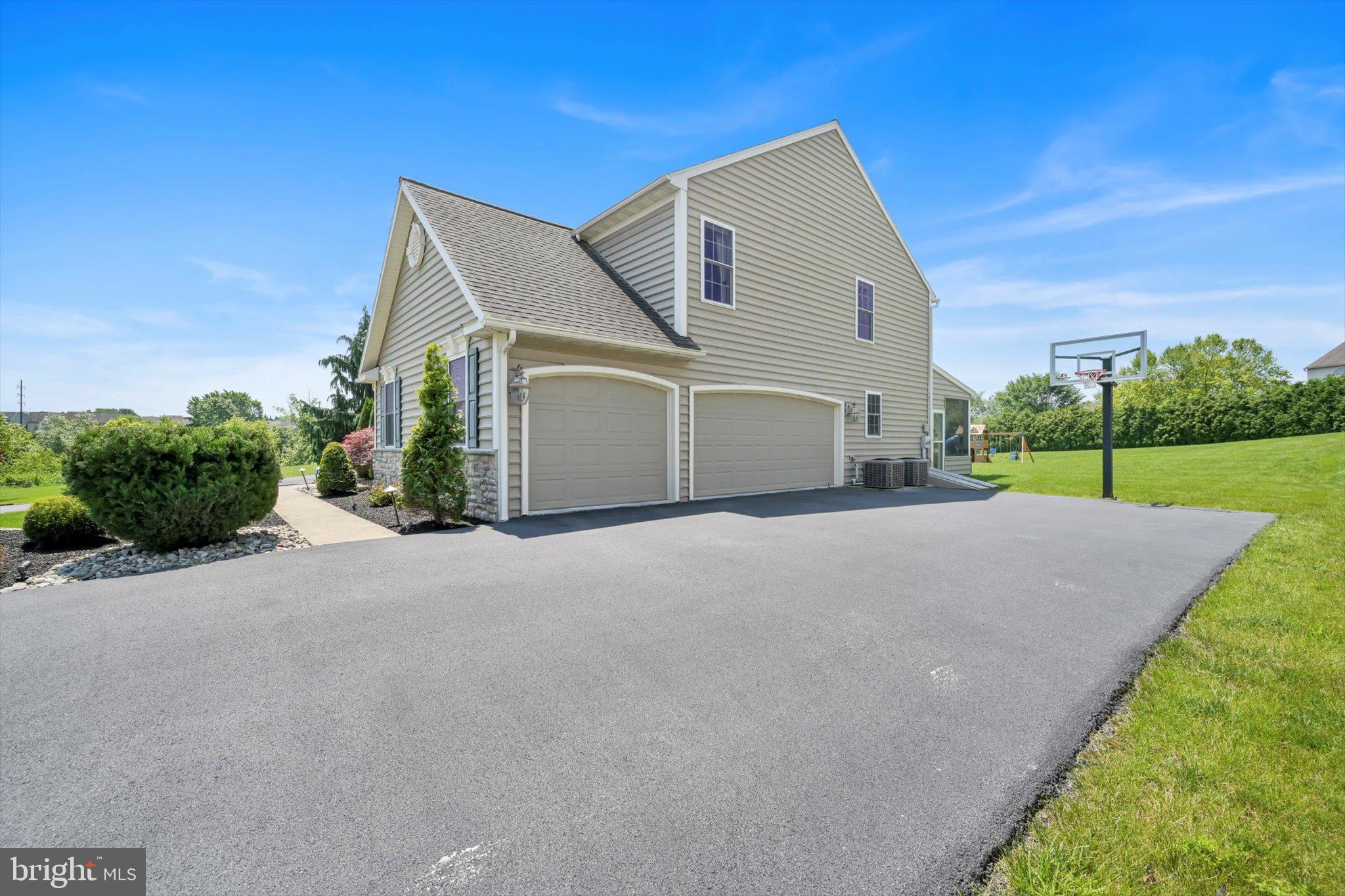118 Connecticut Avenue Sinking Spring, PA 19608 - Photo 50 of 61 a front view of a house with a yard and garage