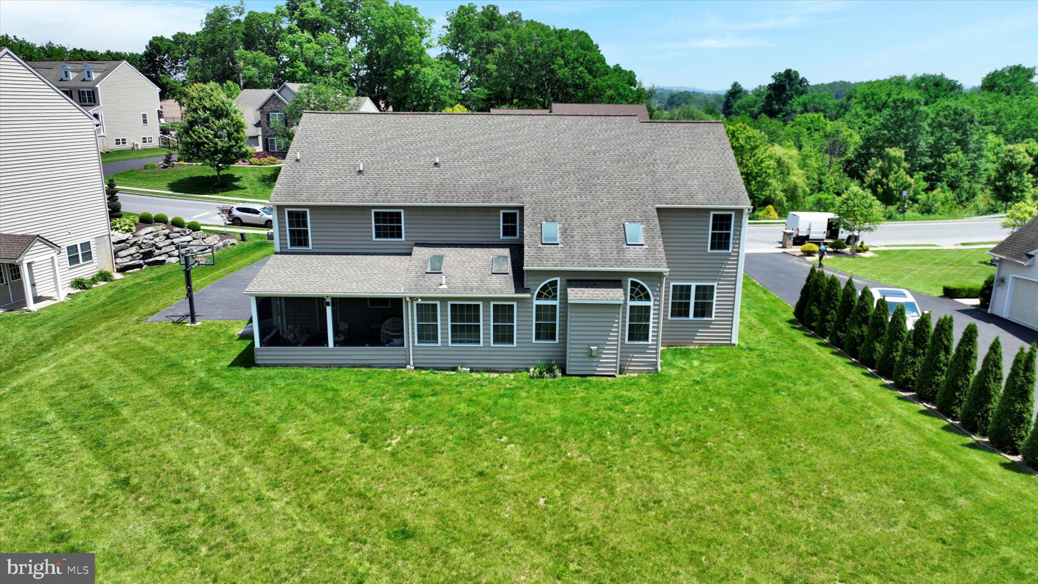 118 Connecticut Avenue Sinking Spring, PA 19608 - Photo 55 of 61 an aerial view of a house with swimming pool and a yard