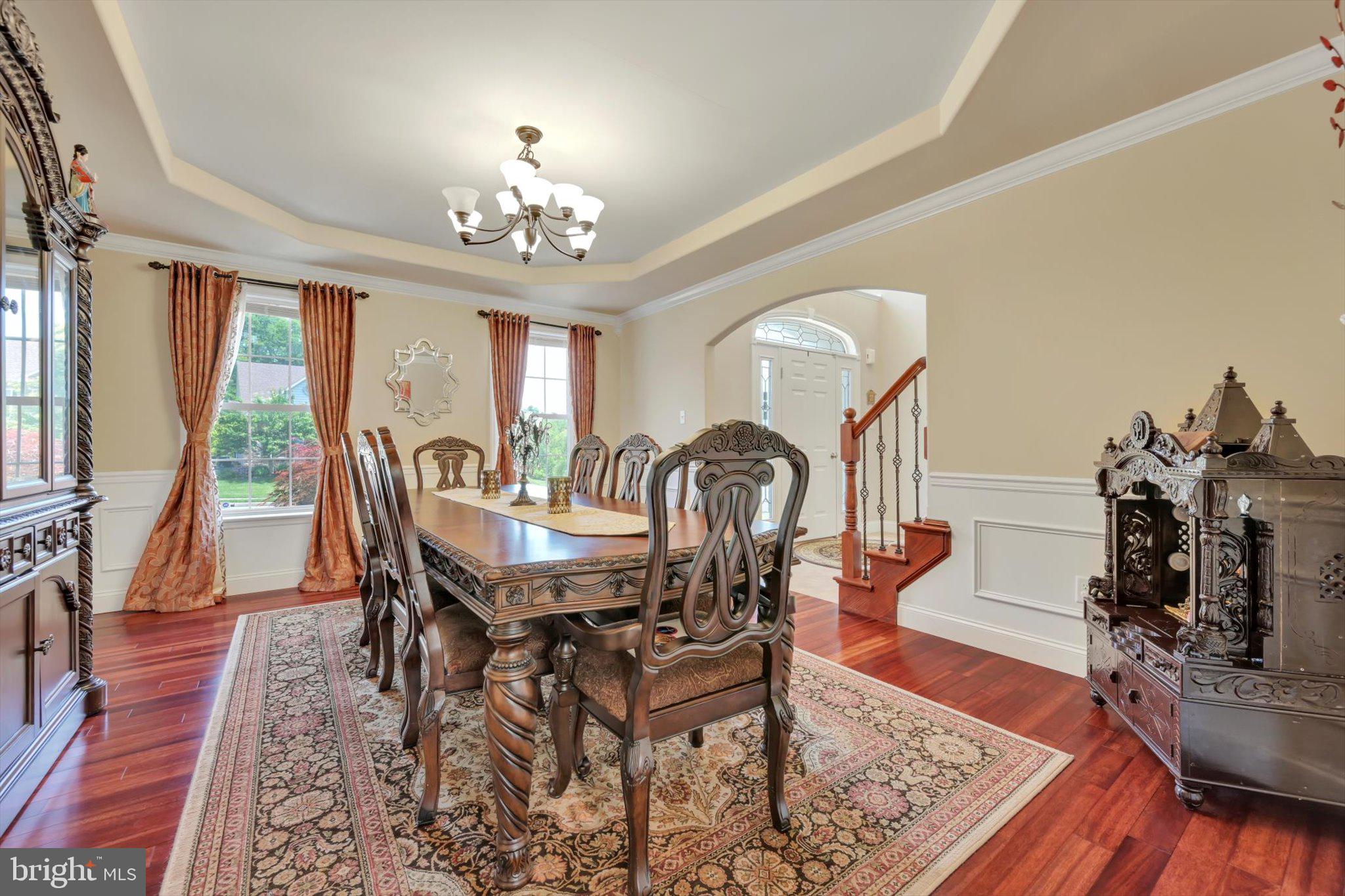 118 Connecticut Avenue Sinking Spring, PA 19608 - Photo 8 of 61 a view of a dining room with furniture a chandelier and wooden floor