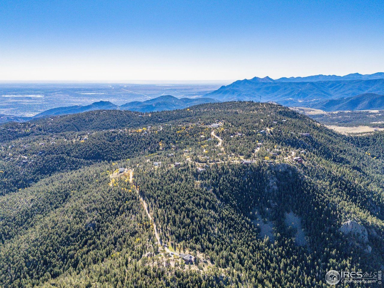 323 Roxbury Drive Boulder, CO 80302 - Photo 21 of 26 a view of a city with mountains in the background
